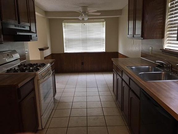 Kitchen view from laundry room and garage entry