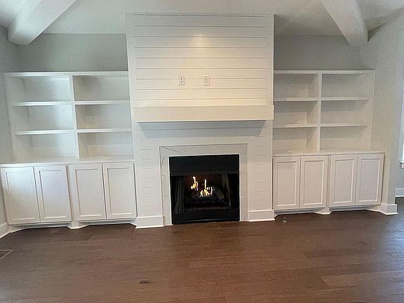 Shiplap and TONS of storage in living room.
