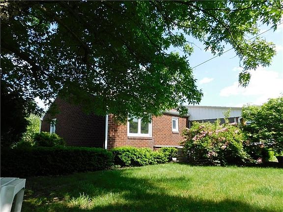 It is all brick and most of the windows have been replaced with beautiful insulated casement windows