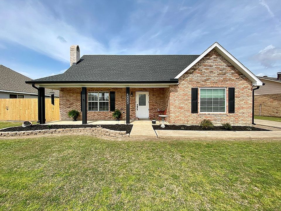 New gutters, posts, brick