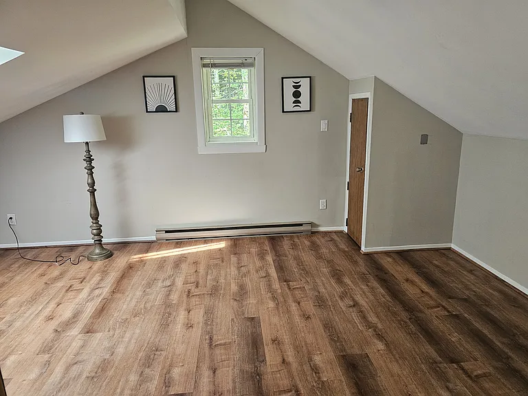 Main bedroom, closet, there is also storage that runs the entire length of the house with doors