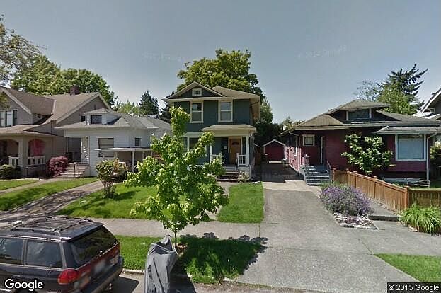 the blue house in the middle