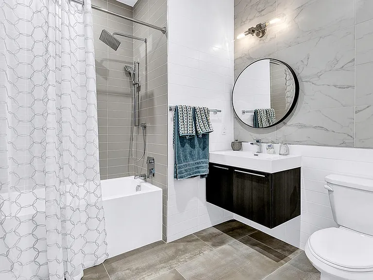 Luxurious Bath with Full Wall Tile