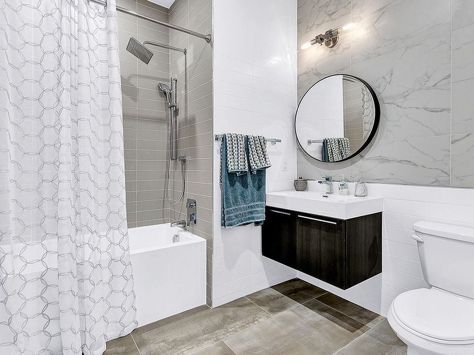 Luxurious Bath with Full Wall Tile