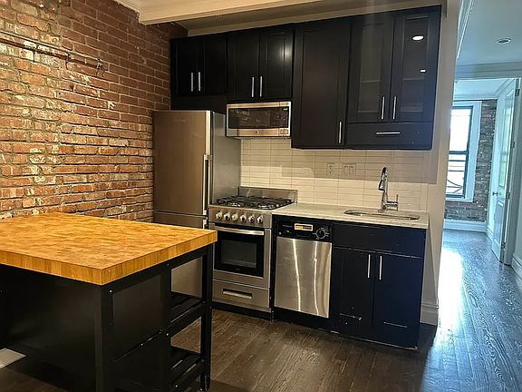 3rd image of 133 E 4th St APT 5