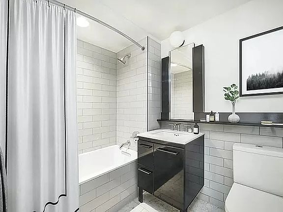 3rd image of 101 E 10th St APT 8A