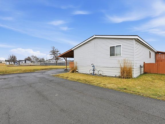 2nd image of 10510 W Richland Rd Lot 11