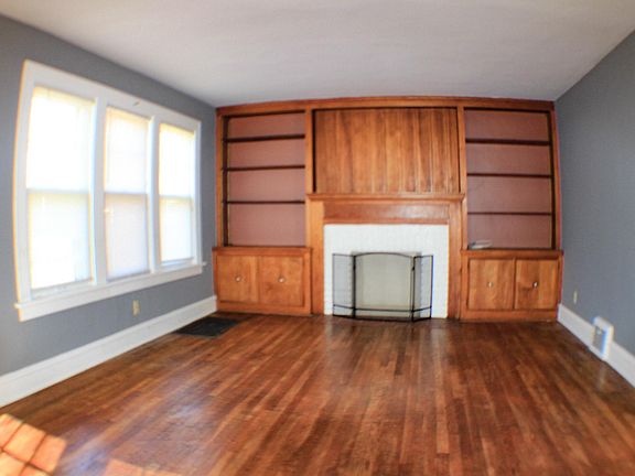 Natural Hard Wood Floors throughout the suite. Natural lighting.