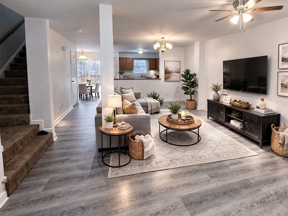 Spacious living room with updated flooring