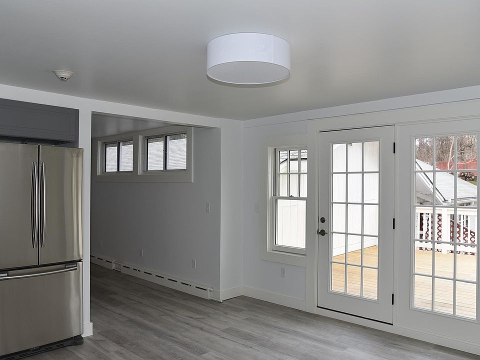 French doors lead from kitchen to deck.