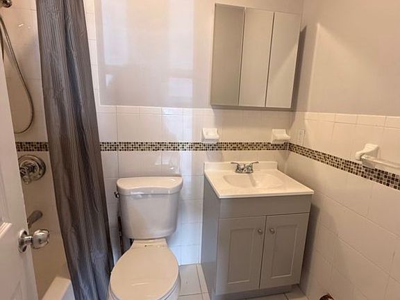 3rd image of 214 Beach 91st St #1