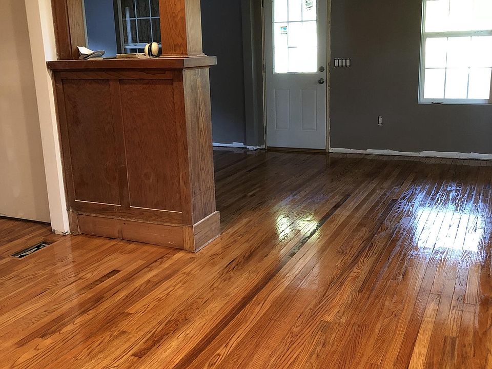 Wood flooring. View of front door from the inside. 