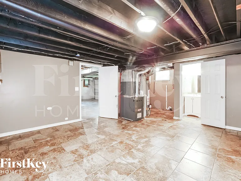 7616 E 51st Ter — Photo 14