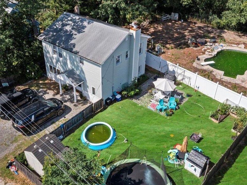 oversized backyard and 2 car drive way garden included