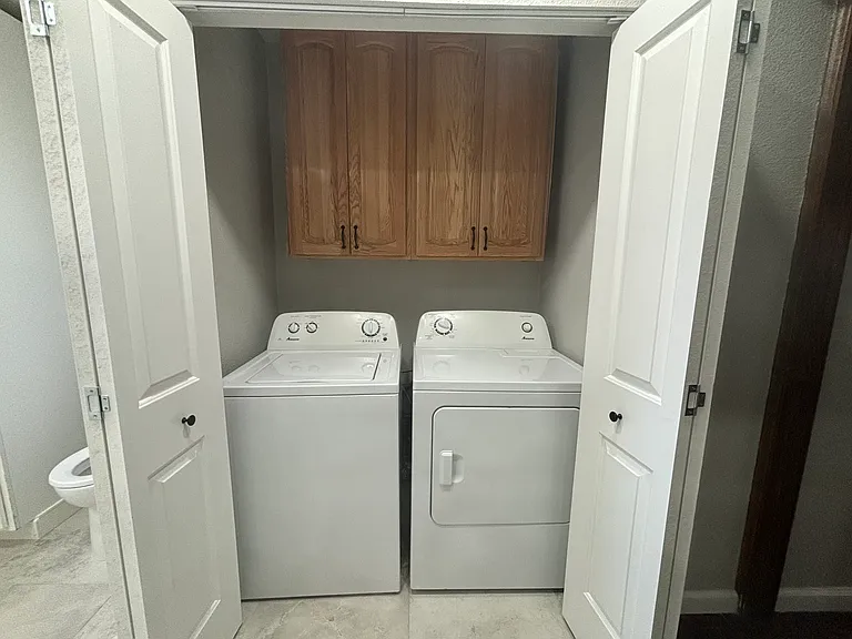 washer dryer off primary bath #1
