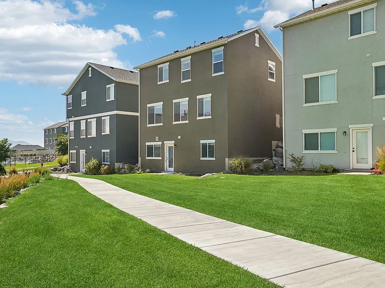 Back of house has large open space that is maintained by the HOA
