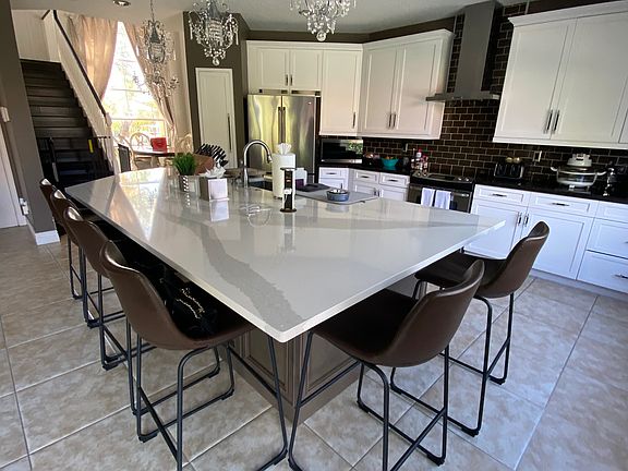 Kitchen large center island easily fits 6