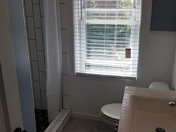 Brand new bathroom with custom shower.