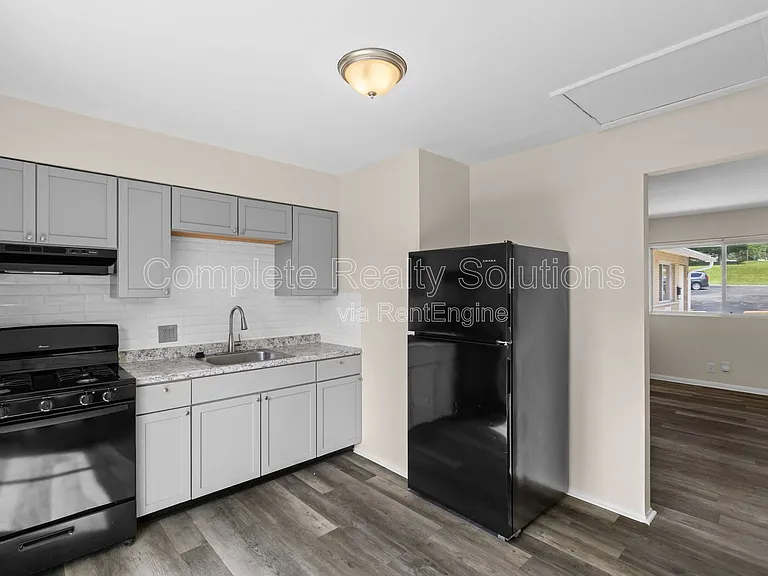 2323 Woodson Rd #I — Photo 1