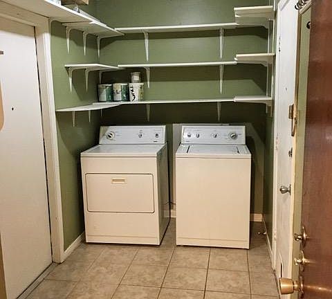 Large laundry room with additional storage for bikes, luggag