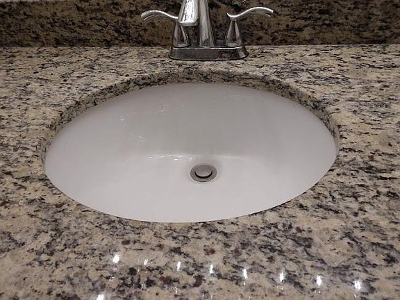 Granite counter in bathroom.