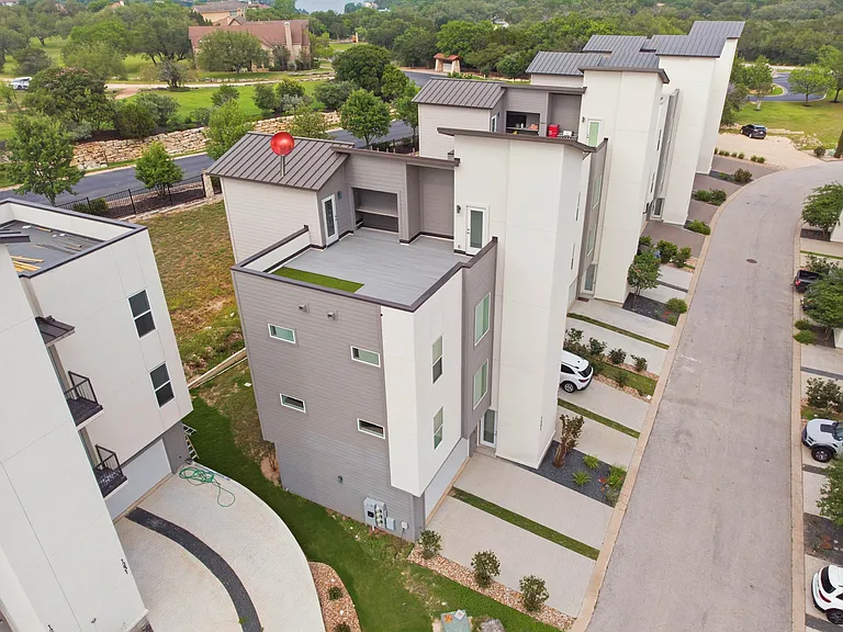 Enjoy the feel of a single-family home in this thoughtfully designed 2-story condo with no neighbors above or below. Private garage, main living on the second level, and a rooftop retreat offer the perfect blend of privacy and modern living.