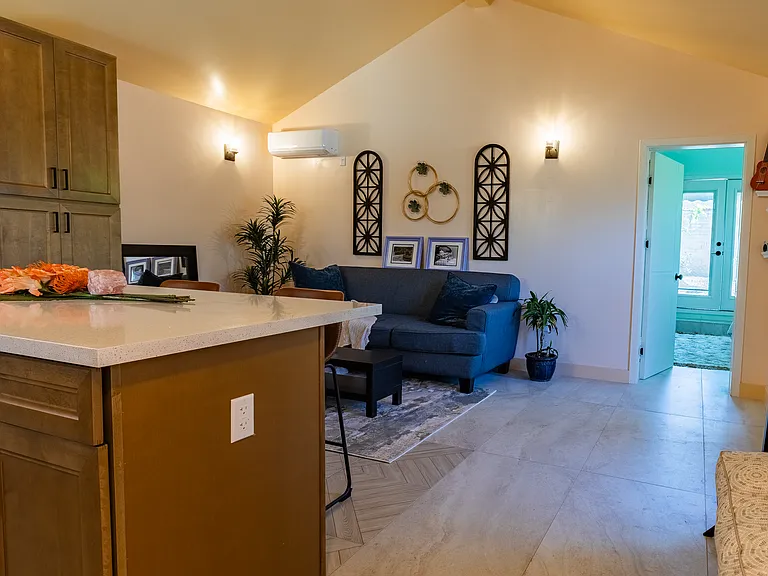 Kick back on the comfy lounge sofa and stream your favorite shows using the Roku system, which adds smart TV capability. A welcoming bench and coat rack make it easy to settle in after a long day of work or play.