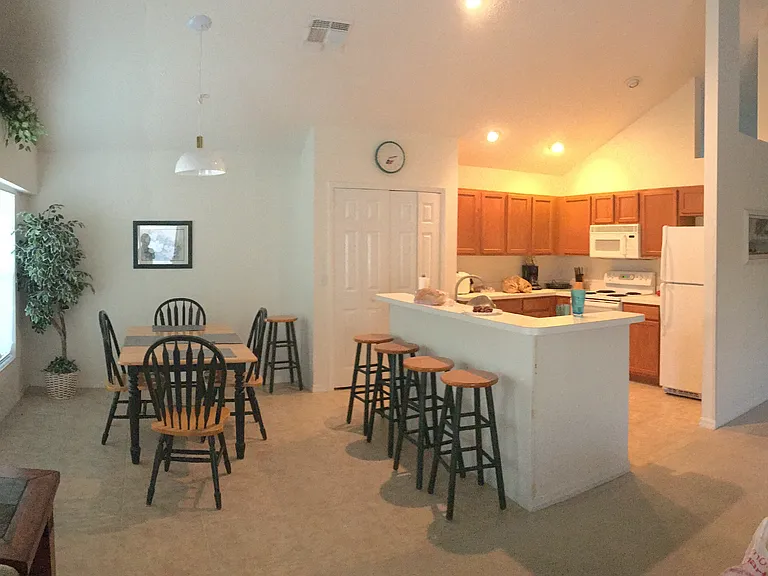 Picture of the home furnished before the luxury vinyl on the floor and new gray paint on the walls.