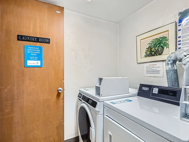 Shared laundry on each floor in building.