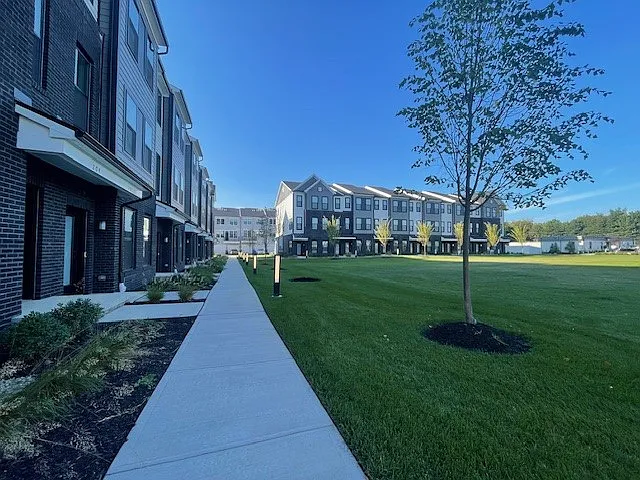 Lawn, greenery & walking pathway right outside - 212 Peyton Pl