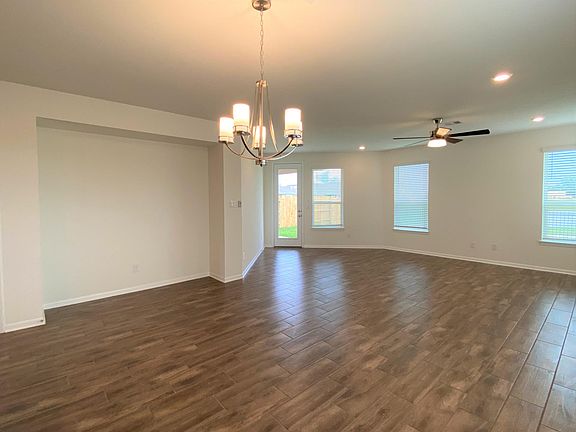 Large family room with water view, 8' door to the patio and backyard