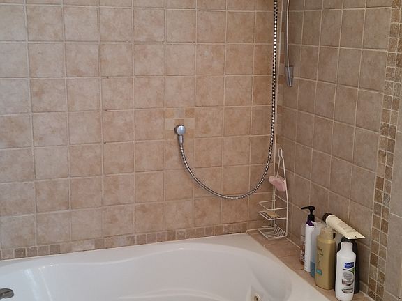 master bath with jetted tub