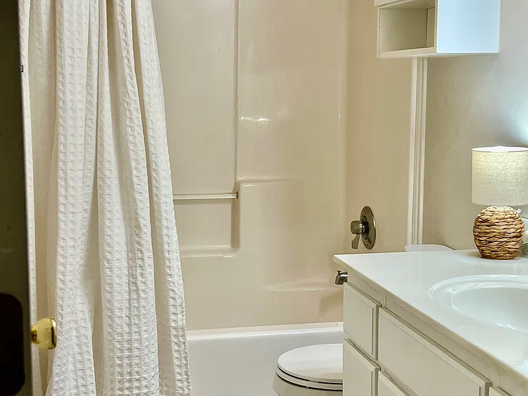 Full Hall Bathroom. Lots of cabinet and counter top space