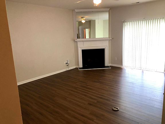 Renovated floors with a fireplace.