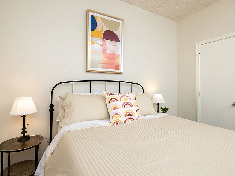 Bedroom #2- Queen bed with extra blankets and pillows
