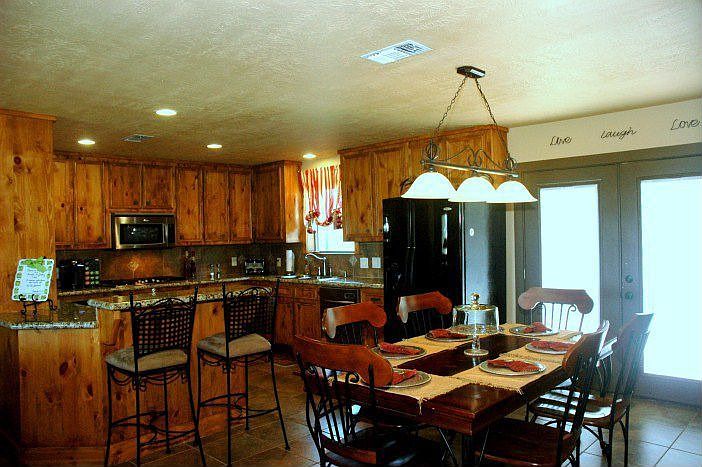 Dining has French doors out to patio area.