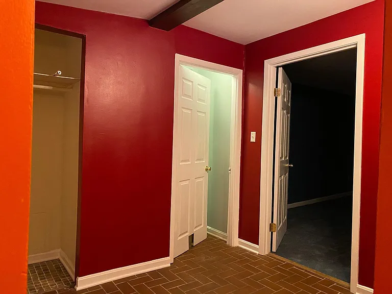 Closet and entrance to bedroom and kitchen