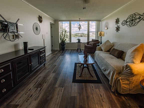 Living Room, Crown Molding throughout, Custom Floors throughout.
