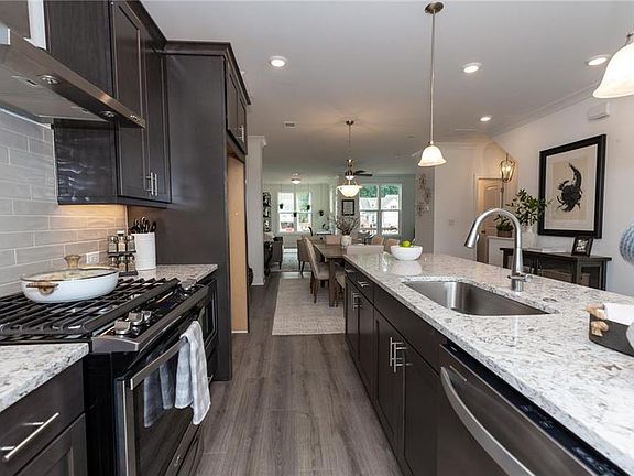 PHOTOS NOT OF ACTUAL HOME, BUT OF previously built Garwood Model Home by The Providence Group Ho