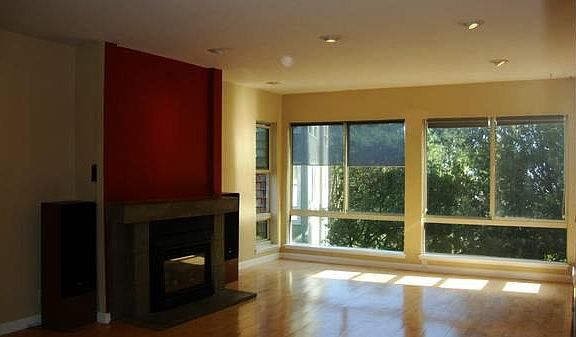 View from the dining room to the living room and the fire pl