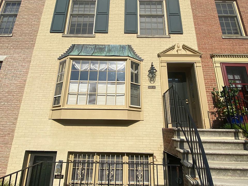 Front entrance to the townhome. The condo is located on the top two floors and the front half of this building