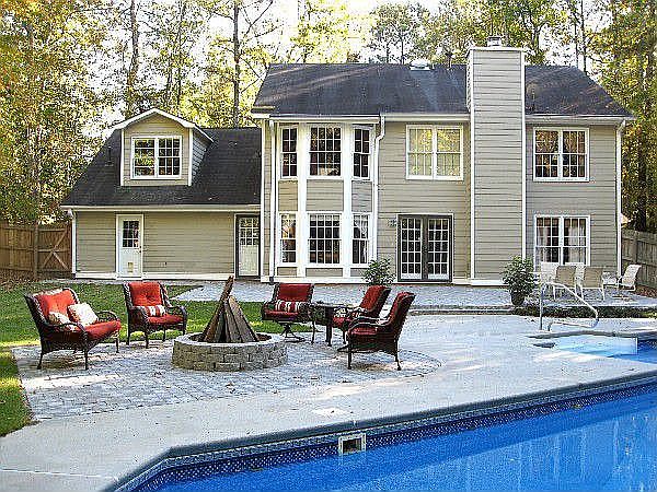 Back View of Home with New Firepit and Patio