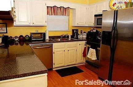 Kitchen						:						All stainless steel appliances stay except for fridge. Stove is electric.