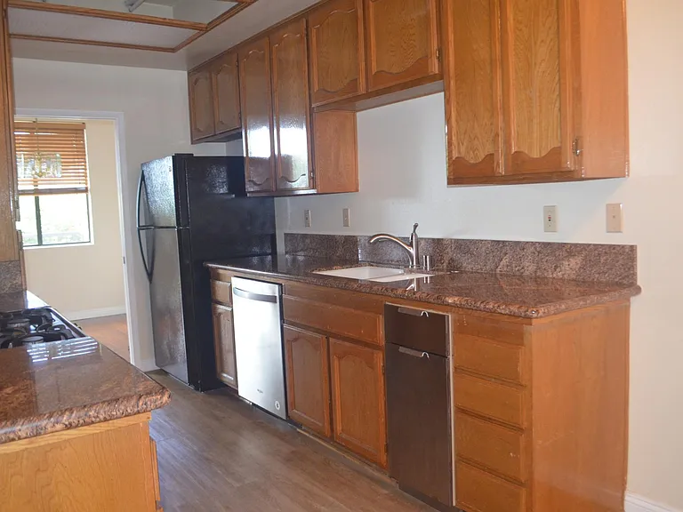 Granite countertop with ample pantry space