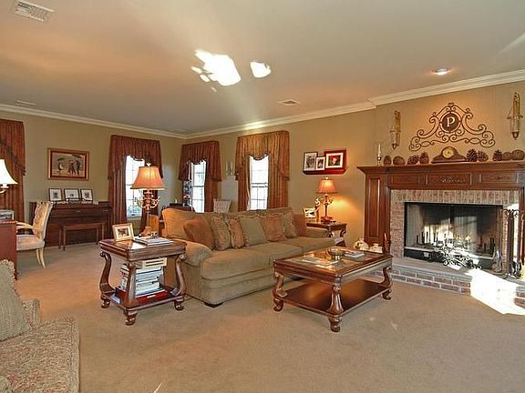Sprawling family room with estate size wood-burning fireplace...