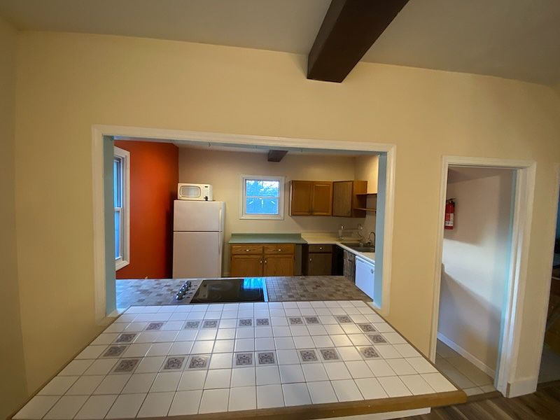 Looking into kitchen from large main room.
