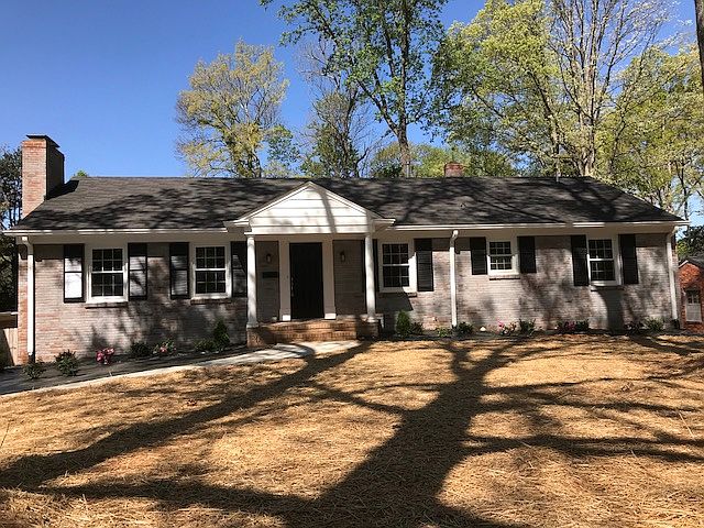 Lime washed brick exterior. 