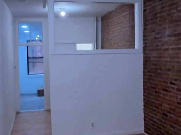 3rd image of 317 E 9th St APT 1