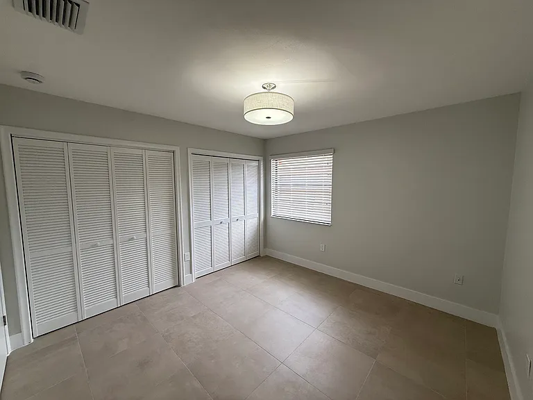 Bedroom 2 with wall to wall closet