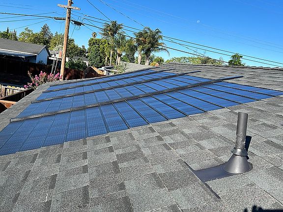 Solar shingle arrays